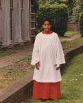 Ivan Hodge in red and white performance cassock robes